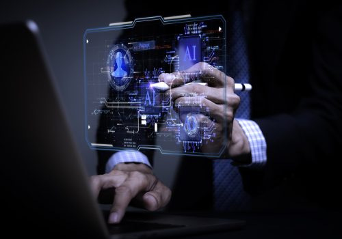 A professional interacts with a digital interface showcasing AI technology, relevant for a Machinery Parts Supplier.